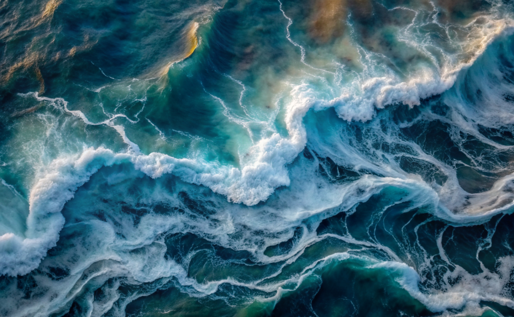 Swirling turquoise ocean current from above